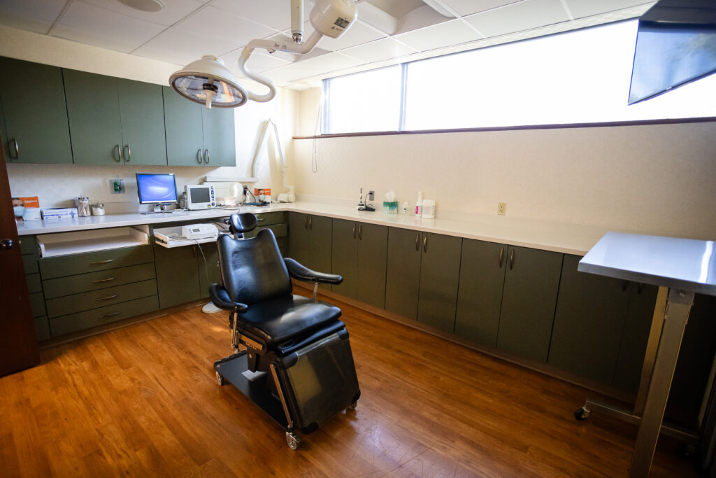 A cosmetic surgery office environment featuring a clean and organized workspace with visible equipment.